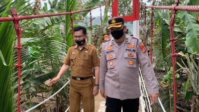 Polres Tanggamus Resmikan Jembatan Merah Putih Penghubung Dua Kecamatan